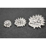A set of three modern Swarovski silver crystal glass studies of Hedgehogs
