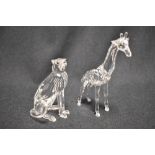 Two modern Swarovski silver crystal glass animal studies of a Giraffe and a Cheetah with boxes
