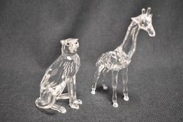 Two modern Swarovski silver crystal glass animal studies of a Giraffe and a Cheetah with boxes