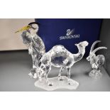 Three modern Swarovski silver crystal glass studies of animals including Heron, Camel and Ibex