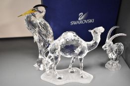 Three modern Swarovski silver crystal glass studies of animals including Heron, Camel and Ibex