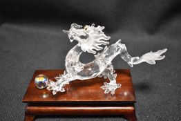 A modern Swarovski silver crystal glass figurine of a Chinese dragon