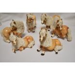 A set of six modern Cheval ceramic figurines of cartoon style horses