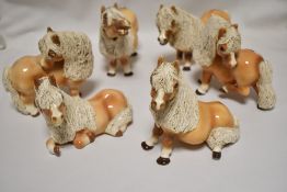 A set of six modern Cheval ceramic figurines of cartoon style horses