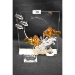 A modern Swarovski silver crystal glass figure group titled Harmony with box
