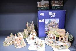 A selection of Lilliput Lane studies, including Santas little helper, Going to the Snowball and