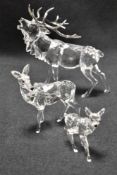 A family of three modern Swarovski silver crystal glass deer and stag with box