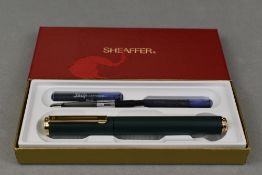 A boxed Sheaffer Award cartridge /converter fountain pen in green with Sheaffer M nib