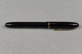 A Waterman Champion 501 leverfill fountain pen in black with single band to the cap having