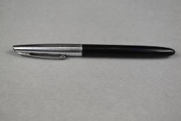 A Waterman Cartridge/ Converter fountain pen in black having steel cap with Waterman 14ct nib.