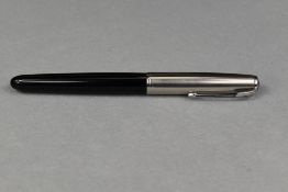 A Parker 51 fountain pen in black with steel cap. Approx 13.6cm