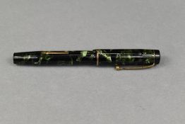 A Mentmore Auto Flow leverfill fountain pen in green/black marble with single band to cap having