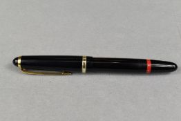 A Rotring Tintenkuli (TIKU) stylus piston fill fountain pen in black with single band to cap. Approx