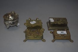 A selection of brass cased stamp boxes including Art Nouveau design