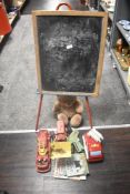 A shelf of vintage Toys including Triang Blackboard, Loading Shovel and plastic Fire Engine etc