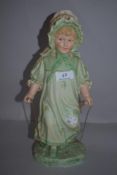 A Victorian German Gebruder Heubach bisque figure of a girl with skipping rope,approx 32cm.