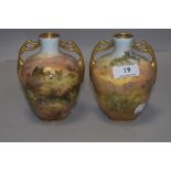 A pair of Royal Doulton Burslem J Hughes hand painted vase with views of Harlech Castle HB8065