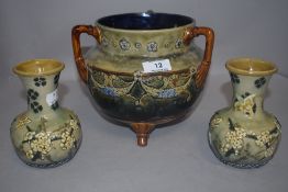 Three pieces of Doulton Lambeth including a pair of Annie Horton, Imogen Durtnall squat vase, and