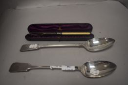 Two 20th century large sized fiddle back serving spoons and a HM silver pickle fork