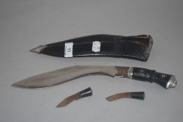 A 20th century Kukri knife marked India in leather sheath with horn handle