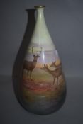 A late Victorian Royal Doulton Joseph Hancock Lucian ware vase hand decorated with deer and highland