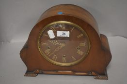 An Edwardian mantel clock with Westminster chime and brass numerals