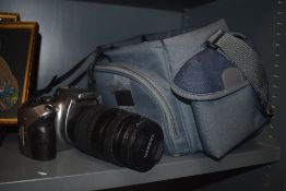 A Canon Eos 300D digital camera with a Tamron macro lens and Canon EFS lens