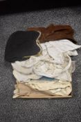 A selection of ladies textiles including bucket hat, suede handbag and leather gloves