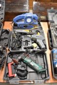 A selection of power tools including belt sander and soldering gear