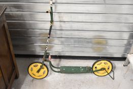 A vintage childrens scooter