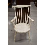 A Victorian painted spindle back arm chair