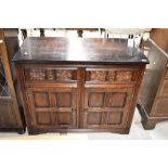 A traditional dark stained sideboard/dresser base
