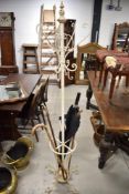 A metal hat and brolly stand, cane etc