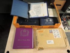 A box of Royalty Stamps, in albums and loose along with a Locomotive Philatelic Album