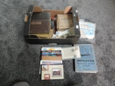 A box containing 17 Cigarette Card Albums and a collection of The Marlboro Art Miniatures Real Photo