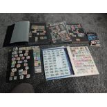 Two stockbooks and a folder of USA Stamps and a stockbook and five stock cards of Italy Stamps, mint