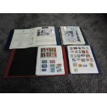 Two albums of World Stamps including Austria and Germany, mint and used along with two albums of