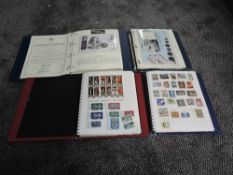 Two albums of World Stamps including Austria and Germany, mint and used along with two albums of