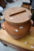 A large earthenware crockpot