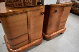 A pair of Art Deco walnut bedside cabinets