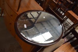 An early 20th Century mahogany oval mirror