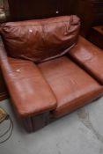 A modern leather armchair in a vintage style