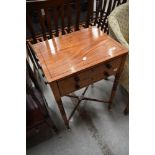 An interesting and unusual 19th Century satinwood centre occasional table having two long drawers on