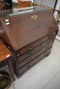 A period style bureau having some early features, possibly an early 20th Century reproduction