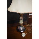 A reproduction Oriental table lamp having tube lined decoration