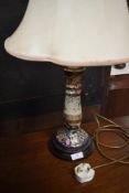 A reproduction Oriental table lamp having tube lined decoration