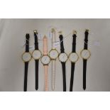 Seven Lily Stone circular faced watches