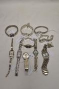 10 ladies watches 2gold,8 silver all with various colours and or sparkly accents