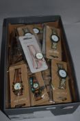 A box of assorted fashion watches new in packaging.