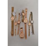 Ten ladies gold tone watches, various makes and styles.